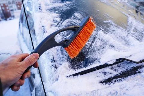 Cleans the snow from the windshield, Scrapes off the ice Foto stock