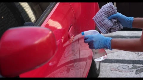 Cleansing car interior and spraying with disinfection liquid Stock Footage 126915665