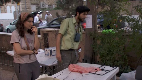 Cleansing Passover kitchen utensils with boiling water. Jerusalem. C0068-2 스톡 동영상 98543504