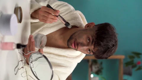 Cleansing problematic skin. A young bearded man applying an anti-acne mask to Stock Footage 259292137