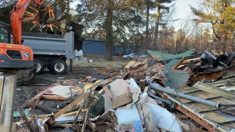 Cleanup of demolition debris Stock Footage 167143967