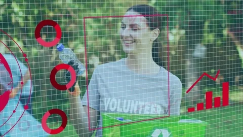 Cleanup volunteer holding bin checking bottle grid and red globe causing tracker Stock Footage 333414344