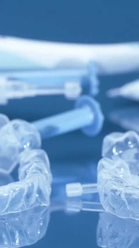 Clear aligners being prepared for teeth straightening treatment at a dental Stock Footage 321378435