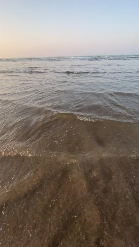 Clear and calm sea at sunset. Vertical video Stock Footage 281262081