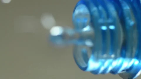 Clear and clear water is poured into a glass cup. bottom view. asmr Stock Footage 153760971