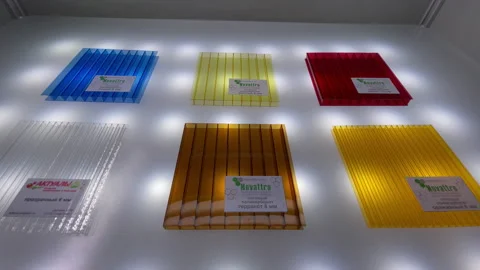 Clear and colored polycarbonate panels in factory packaging Stock Footage 236928367