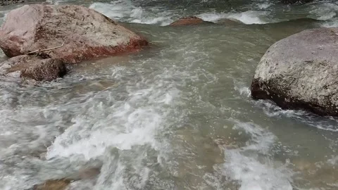 Clear and Rapid Flow of Rocky River Stock Footage 288730177