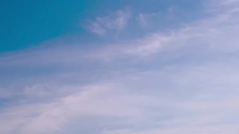 Clear Azure Sky with Light Pink White Cirrus Light Clouds at Sunrise, Time Lapse Stock Footage 202537201