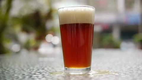 Clear beverage and bubbles of carbon dioxide. fresh beer of double-hop just Stock Footage 265836963