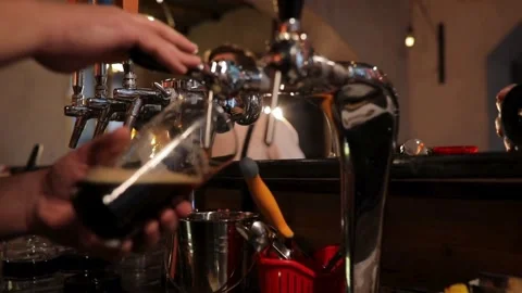 Clear beverage and bubbles of carbon dioxide. fresh beer of double-hop just Stock Footage 265837266