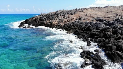 Clear blue sea waves crash on rocky stone beach, Crete Stock Footage 100851676
