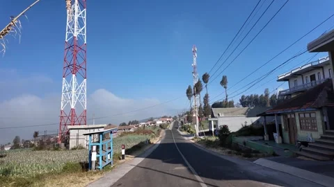 Clear blue sky above asphalt road Stock Footage 345152079