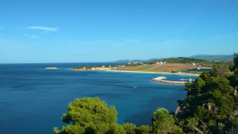 Clear blue sky above calm sea waters. Lagomandra, Greece Video stock 339019569