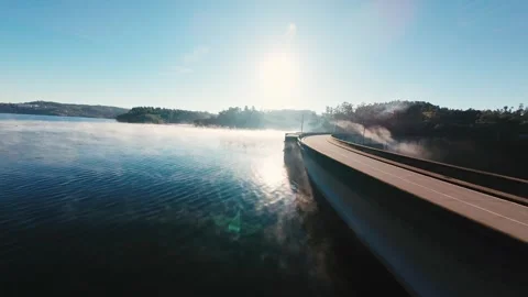 Clear blue sky above calm water surface at Castelo de Bode Stock Footage 342272447