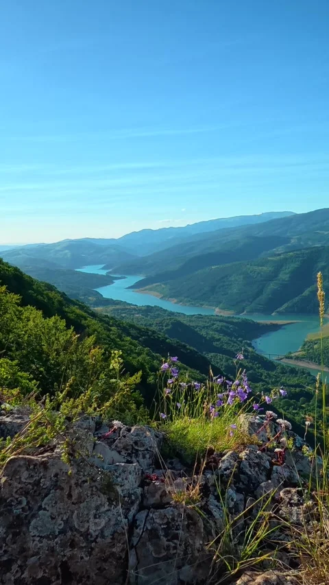 Clear blue sky above green hills. Kozji Kamen viewpoint, Serbia Stock Footage 342343310