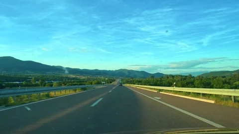 Clear blue sky above long highway stretch. Serbia Stock Footage 340638901