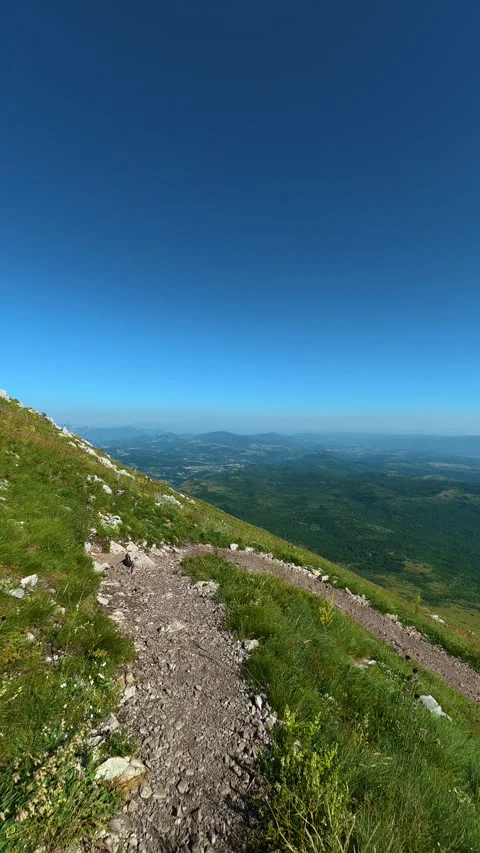 Clear blue sky above a mountain trail. Mount Rtanj, Serbia. Vertical Stockbeeldmateriaal 342318277