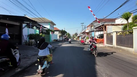 Clear blue sky above quiet village street Stock Footage 345150884