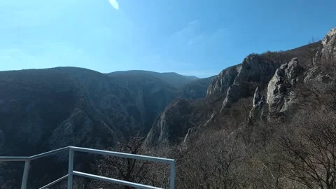 Clear blue sky above rugged mountains. Balkan, Eastern Europe, POV Stock Footage 331433017