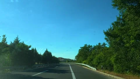 Clear blue sky above winding asphalt road. Macedonia Stock Footage 340638779