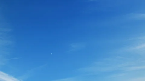 The Clear Blue Sky adorned with Whispy Clouds offers a breathtaking and tranquil Video stock 314454725