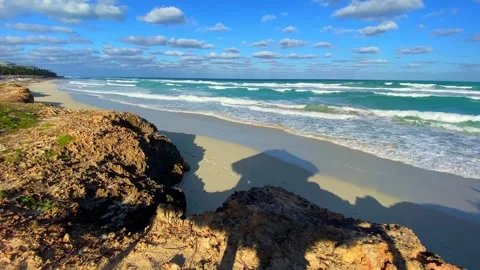 Clear Blue Sky and Calm Turquoise Waves on a Cuban Beach Stock Footage 291113201