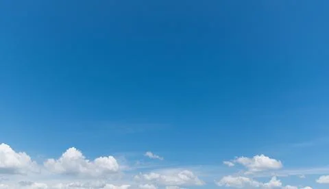 Clear blue sky background,clouds with background. Stockfoto's