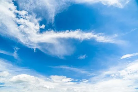 Clear Blue Sky with Clouds Background Stock Photos