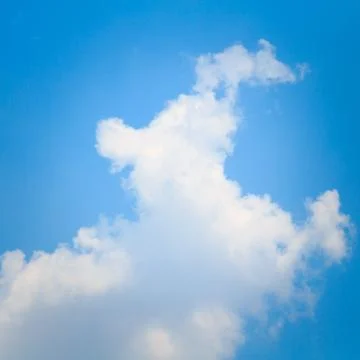 Clear blue sky with clouds Stock Photos