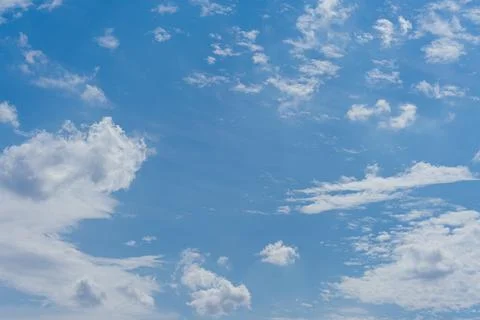 Clear Blue Sky with Clouds Stock Photos
