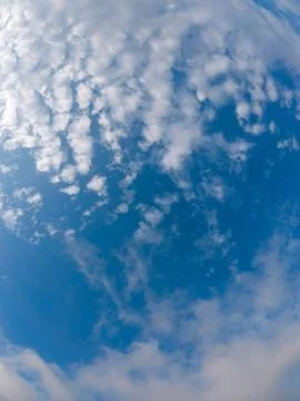 Clear Blue Sky with Clouds Stock Photos