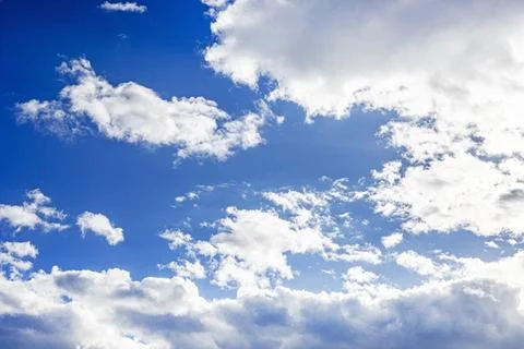 A clear blue sky covered with thunderclouds Stock Photos