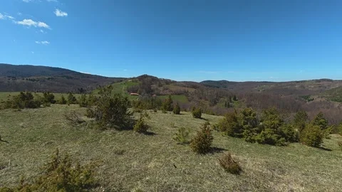 Clear blue sky dominates the mountain scene. Balkan, Eastern Europe, POV Video stock 333442777