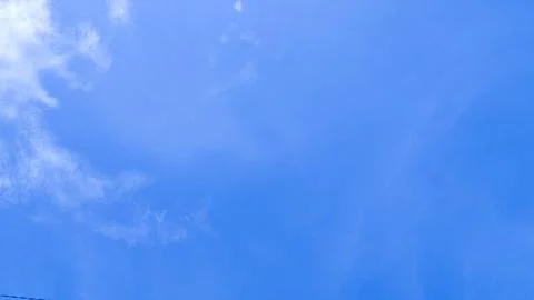Clear blue sky with few clouds Stock Photos