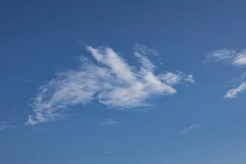 Clear blue sky with a few clouds. Stock Photos