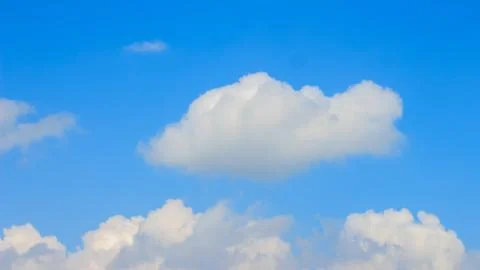 Clear blue sky with few clouds. The sky is very clear and clouds are scatte.. Stock Photos