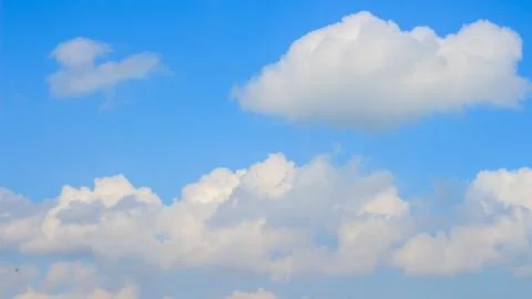 Clear blue sky with few clouds. The sky is very clear and clouds are scatte.. Stock Photos
