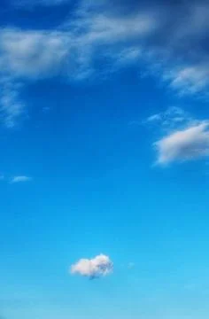 Clear blue sky with few clouds. The sky was very clear, and clouds were sca.. Stock Photos