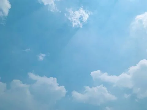 Clear Blue Sky with Fluffy White Clouds and Ample Copy Space Photos