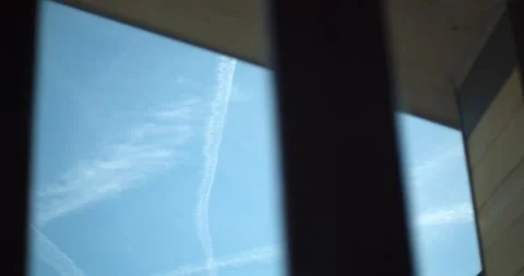 Clear blue sky framed by window and building edges on a bright day 库存影片 339192643