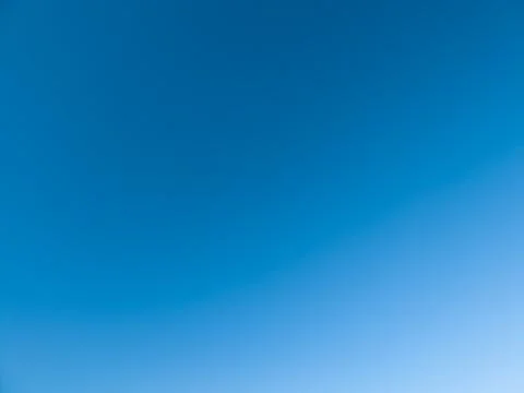 Clear blue sky gradient background with copy space, cloudless daytime sky Photos