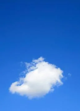 Clear blue sky with one cloud Stock-Fotos