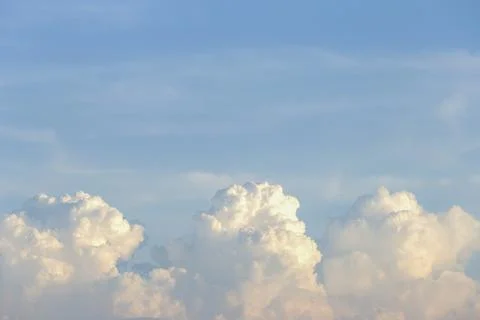 Clear blue sky with plain white cloud with space for text background. The v.. Stock Photos