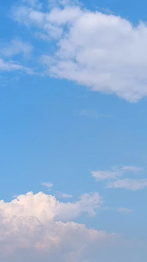Clear Blue Sky with Scattered White Clouds Stock Footage 312104844