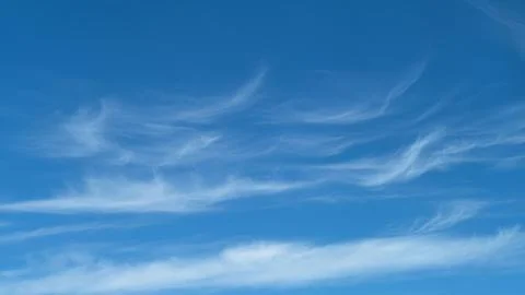 Clear blue sky with thin cirrus clouds. Natural atmospheric background with s Photos