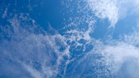 Clear blue sky with thin clouds Stock Photos