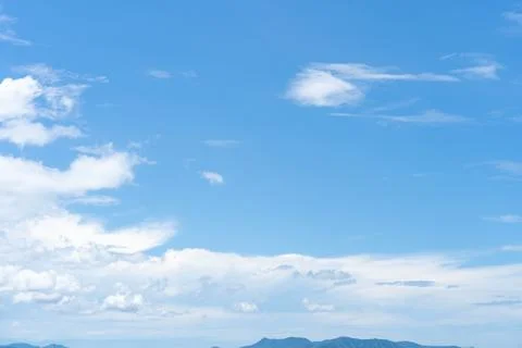 Clear blue sky with white cloud background in the morning. Good weather backg Stock Photos