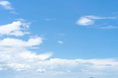 Clear blue sky with white cloud background in the morning. Good weather backg Stock Photos