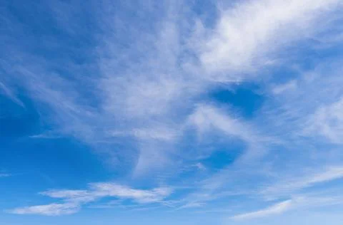 Clear blue sky with white clouds Stock Photos