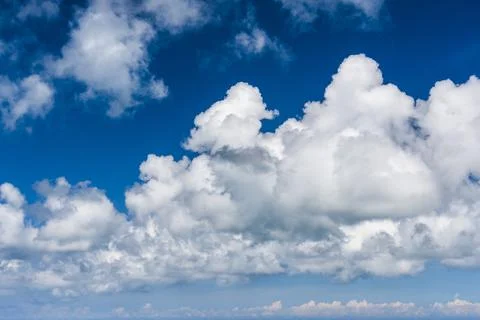 Clear blue sky with white clouds Stock Photos